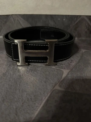 Svart Bälte  - En fin svart Bälte använd ett par gånger 