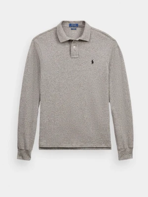 Grå långärmad polotopp från Polo Ralph Lauren - Klassisk grå långärmad polotopp från Polo Ralph Lauren med krage, knappar vid halsen och diskret broderad logga på bröstet. Tillverkad i mjuk bomull för en bekväm känsla. Perfekt till jeans eller chinos.