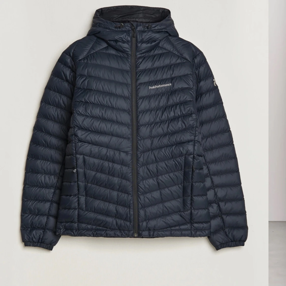 Mörkblå dunjacka från Peak Performance