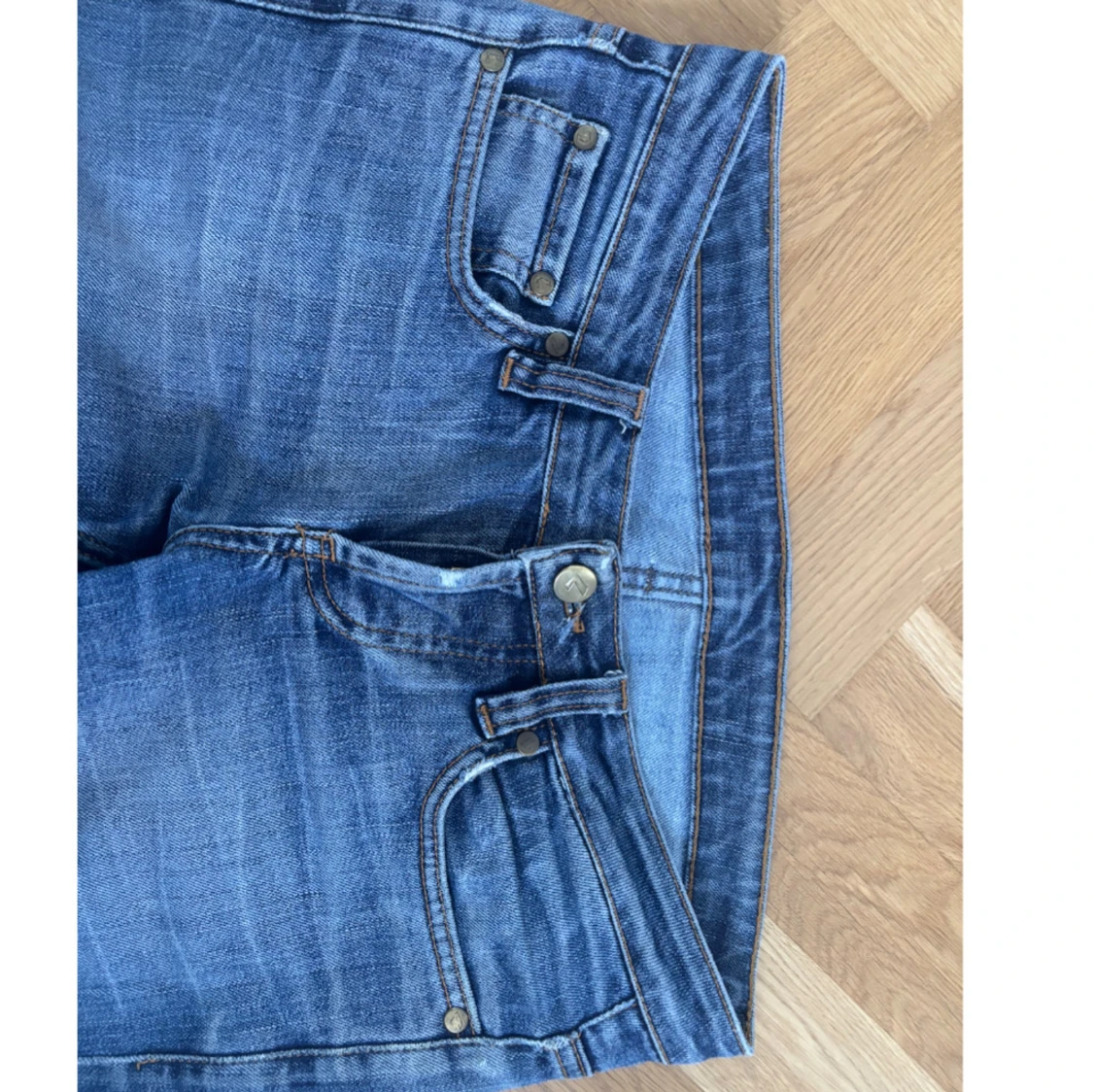 Blåa lågmidjade bootcut jeans - 2