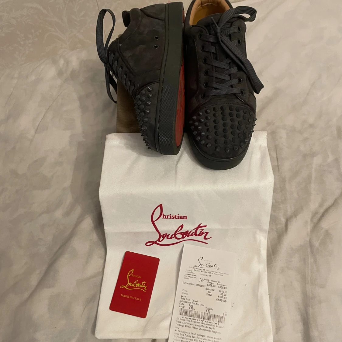 Svarta Christian Louboutin sneakers med nitar