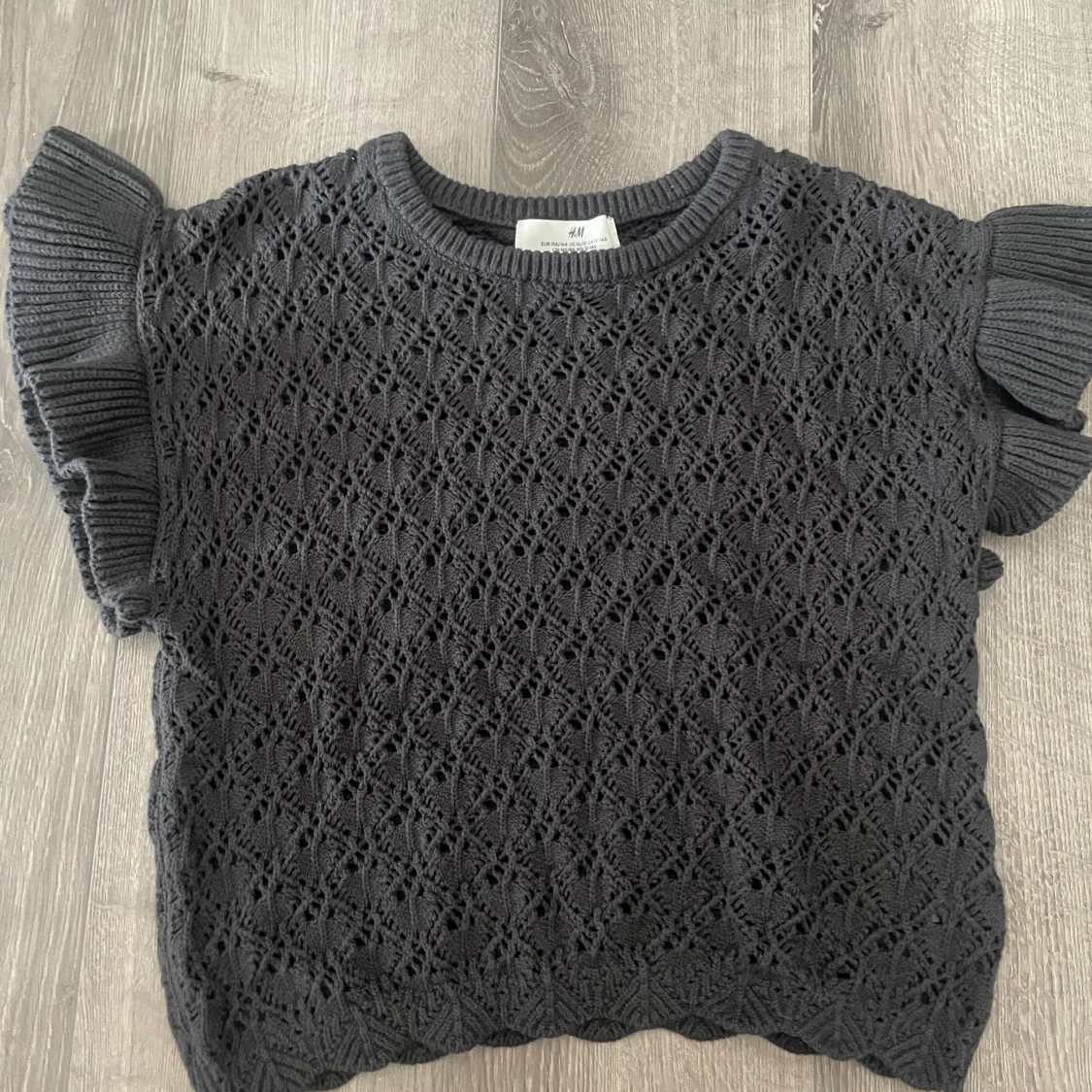 Svart stickad topp från H&M