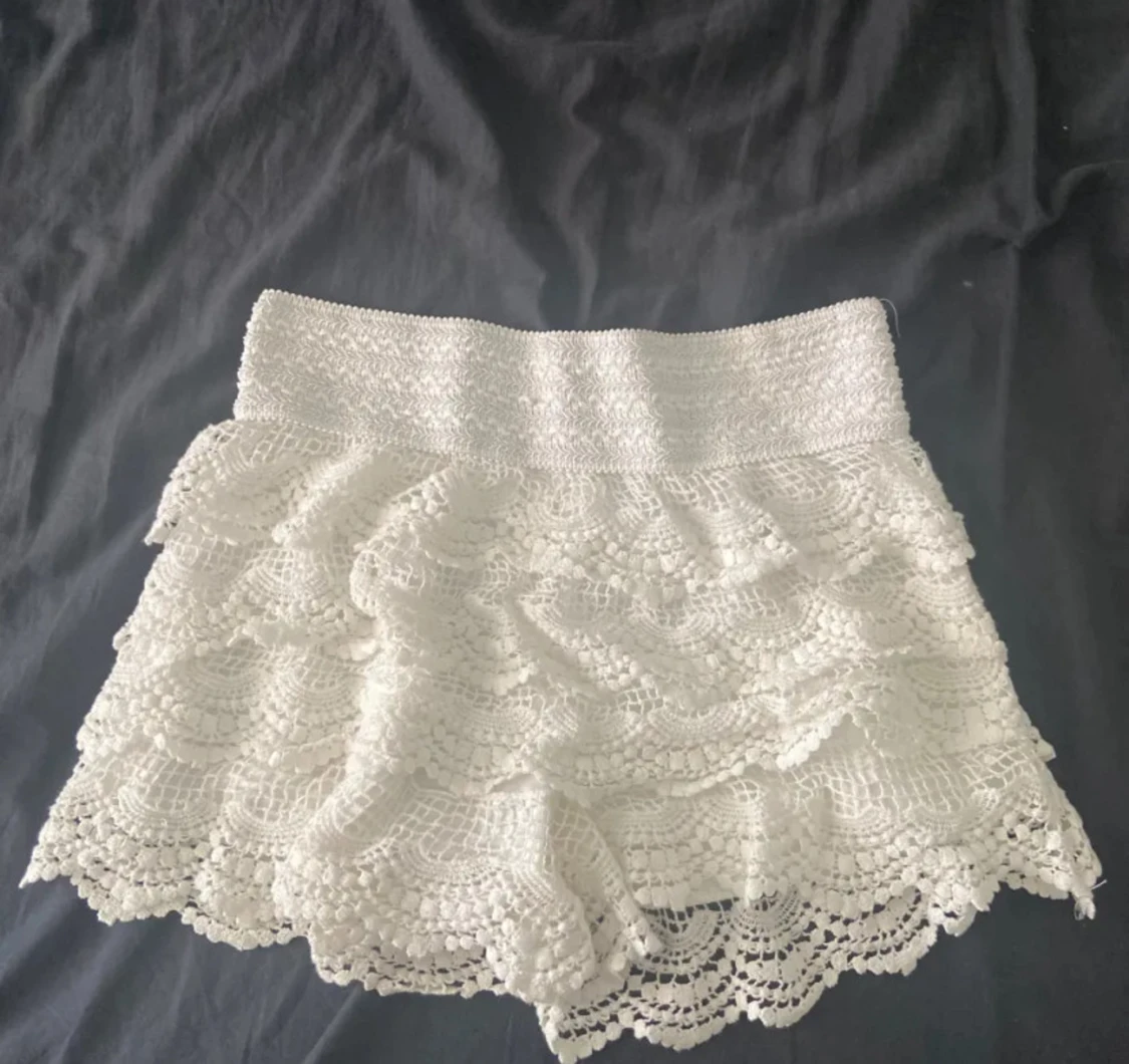 Spetsshorts/kjol stl XS