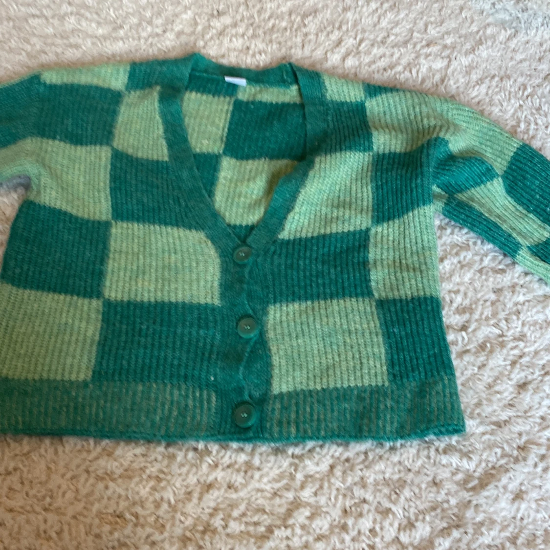 Grön rutig kofta från Lindex