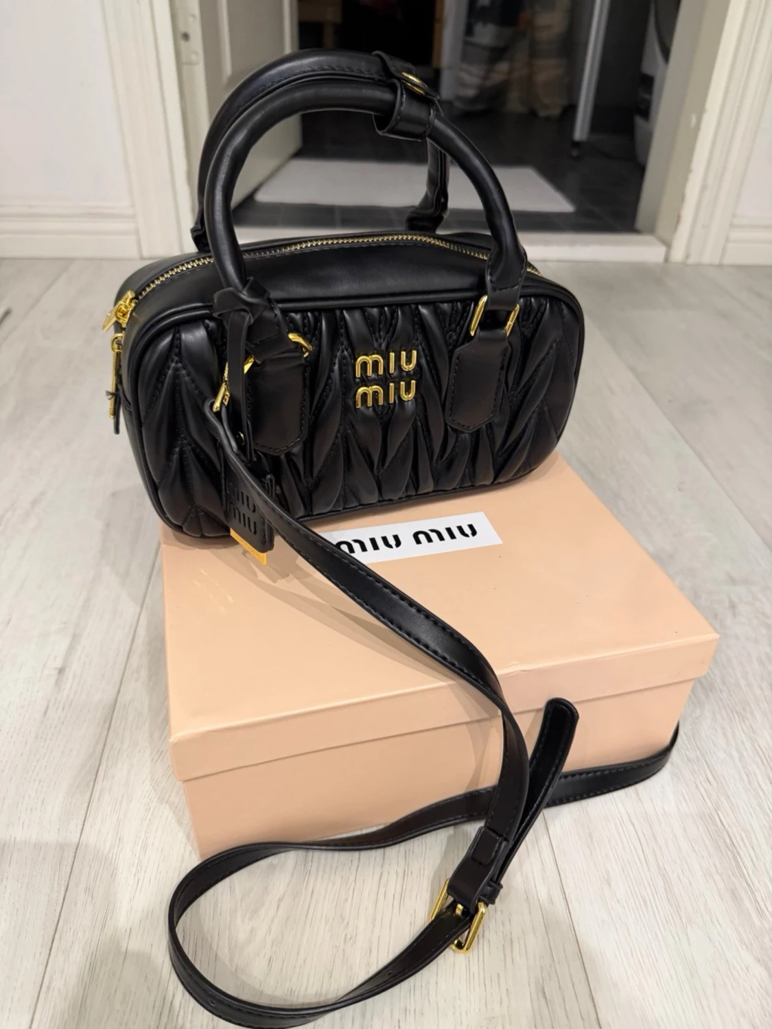 Miu Miu black leather purse/bag