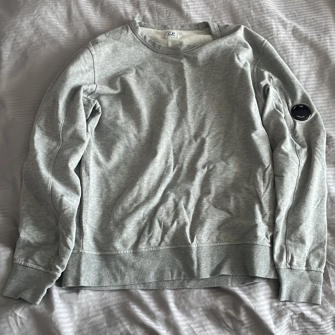 Grå sweatshirt från C.P. Company