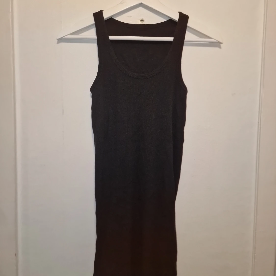 Svart ribbad linnetopp