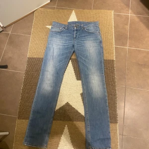 Dondup jeans - 33W, knappast använda.