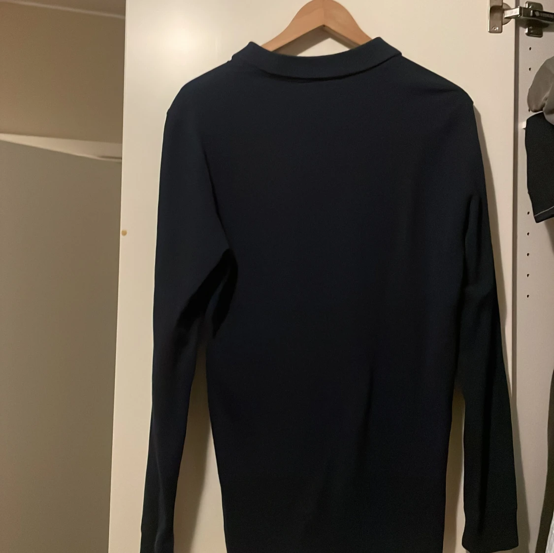 Mörkblå pikétröja från Pier One - 90