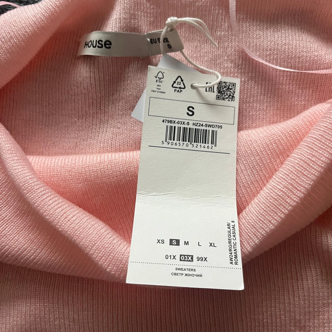 Ljusrosa ribbad tröja från House - 90