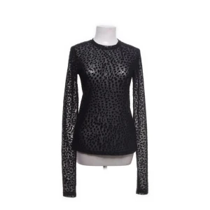 & other stories topp  - Topp från & other stories. Mesh och ganska genomskinlig.