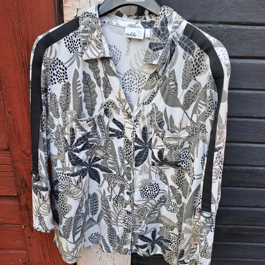 Mönstrad blus stl L