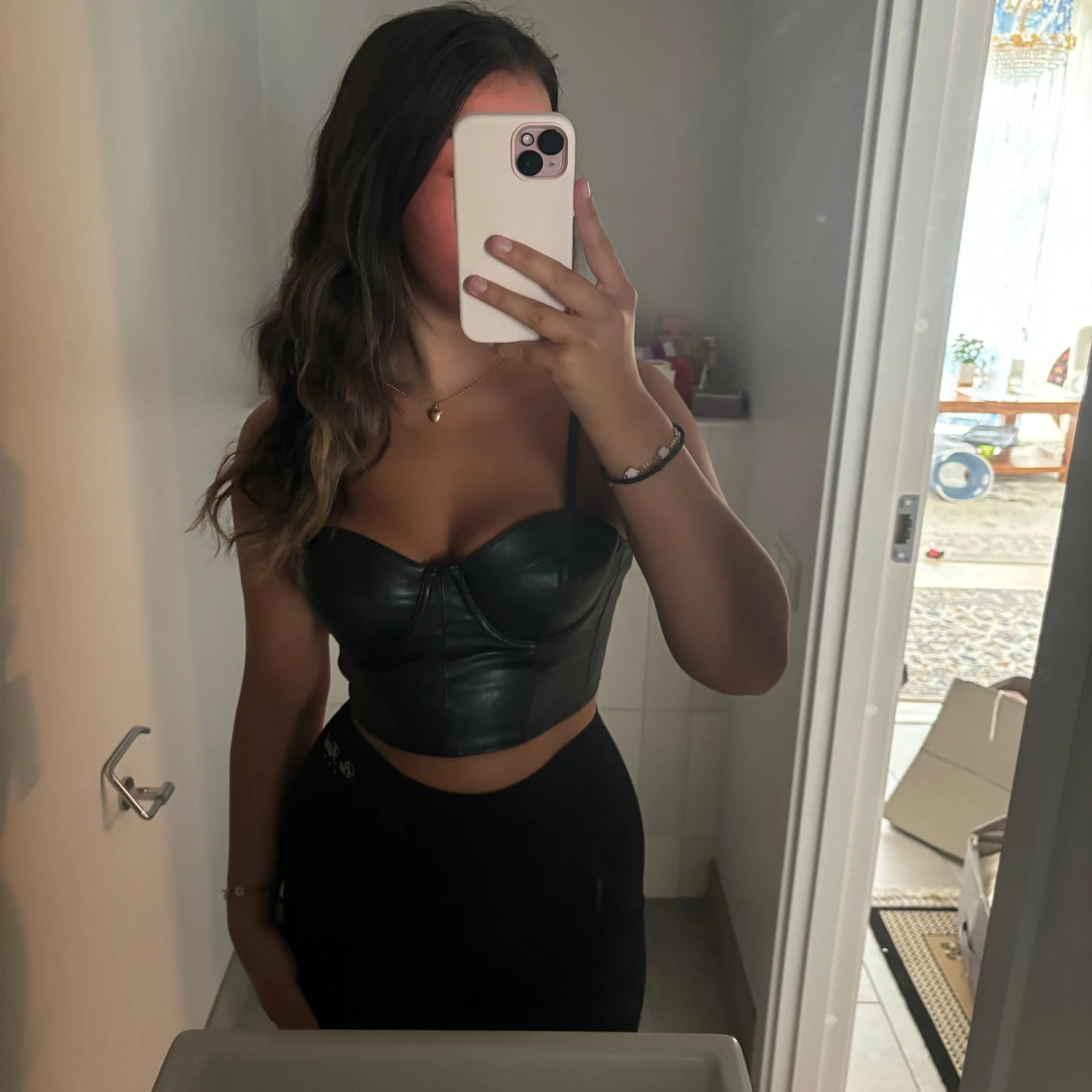 Fest topp i läder imotation