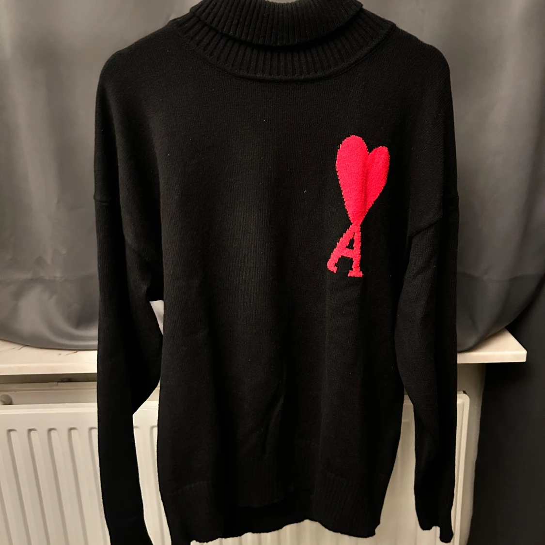 Svart polotröja från Ami