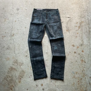 Waxed jeans - Waxed och Bleached jeans. Vintage skick med distressing. Skinny passform 