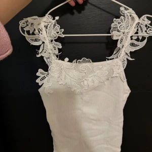 lace top - cute top, worn only once but there’s small stain in front (not very visible!) 