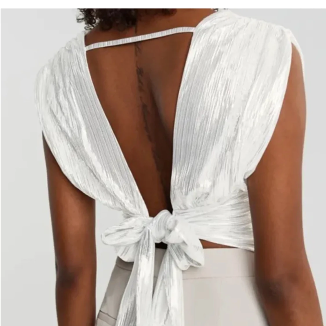 Glittrig topp låg rygg  - 90