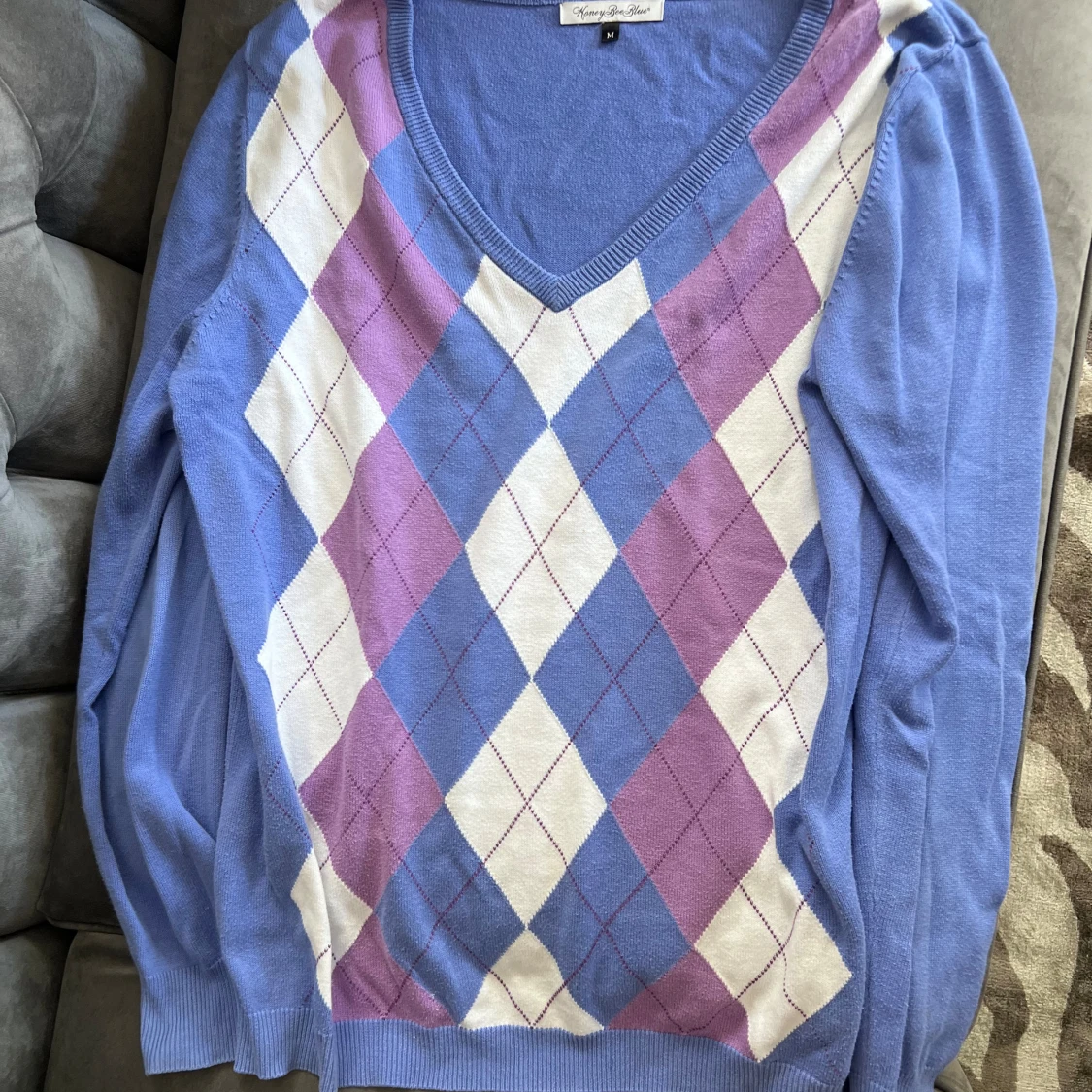 V-ringad stickad tröja