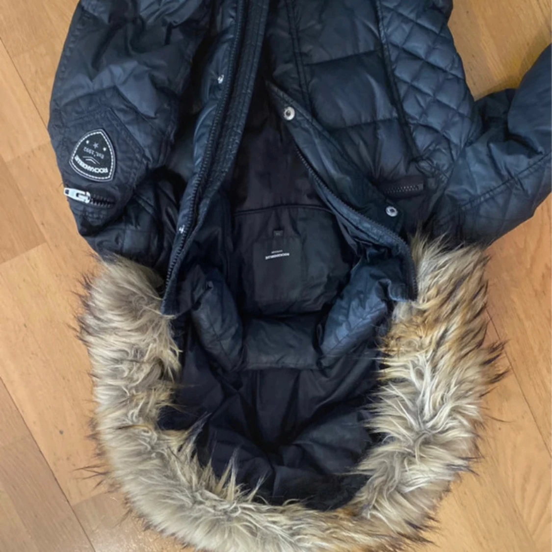 Svart quiltad dunjacka från Woolrich - 2