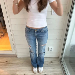Lee jeans  - Jätte fina Lee Jens med slitningar 