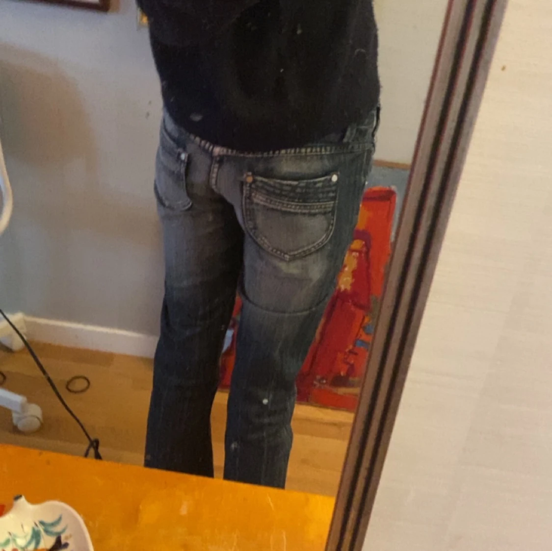 Mörkblå bootcut jeans med slitningar - 1