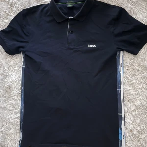 Boss piké - En boss piké som jag köpte i självaste affären i göteborg. Det var sista kvar så jag tog chansen. Köpte den för 800kr