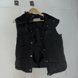 Västjacka - En pufferjacka väst, bra skick