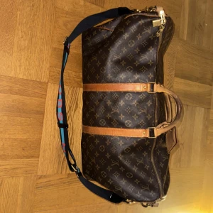Louis Vuitton keepall 55 bandouliere - Keepall bandouliere 55. Used but carefully. Original band and Marc Jacobs band included