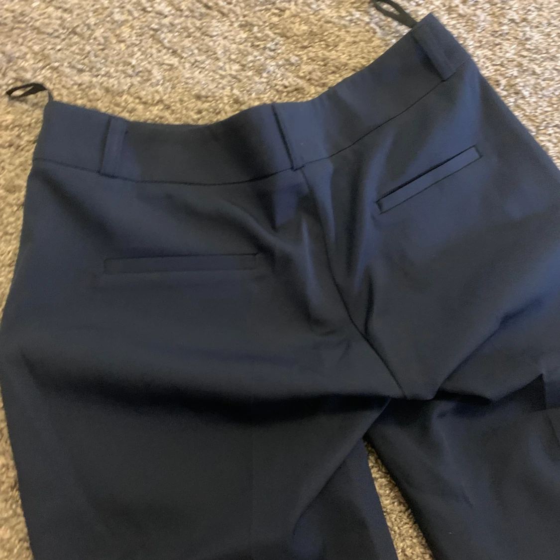 Marinblåa kostymbyxor - 90