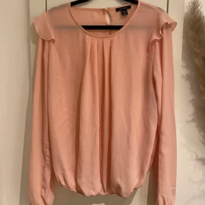 Rosa blus - Rosa blus i Stl M från New Yorker