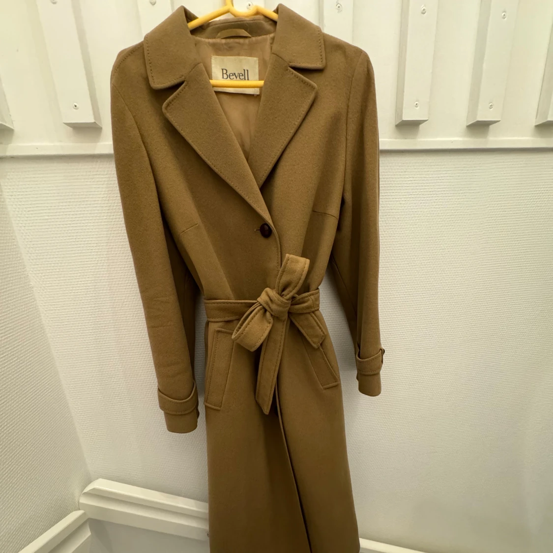 Beige kappa från Bevell