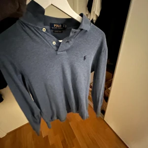 Ralph Lauren piké  - Nypris 1200 i toppskick  Storlek s