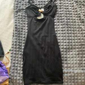 Klänning - Oanvänd med prislapp på.  Originalpris 149kr