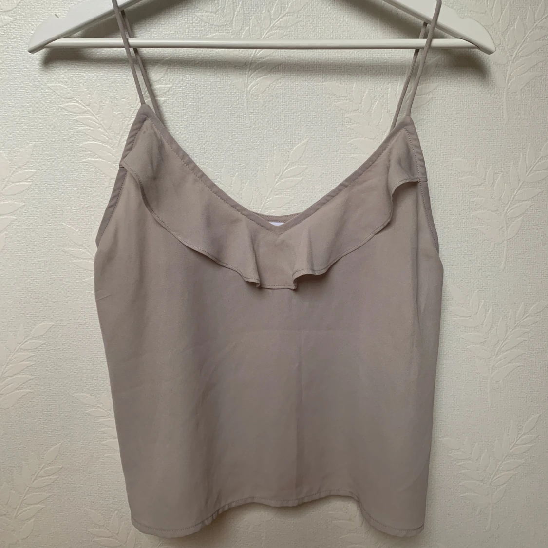 Beige linnetopp från Gina Tricot