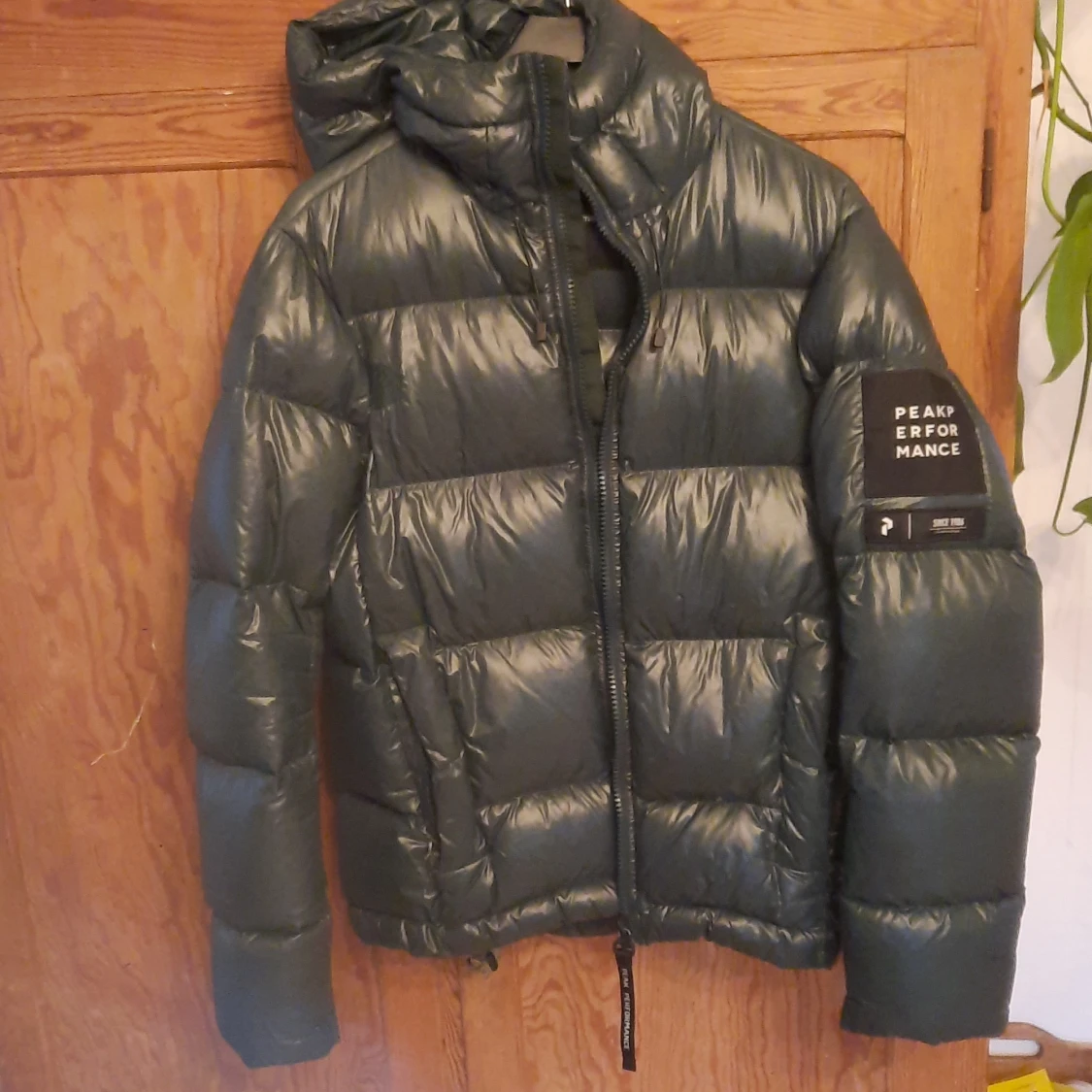 Grön pufferjacka från Peak Performance