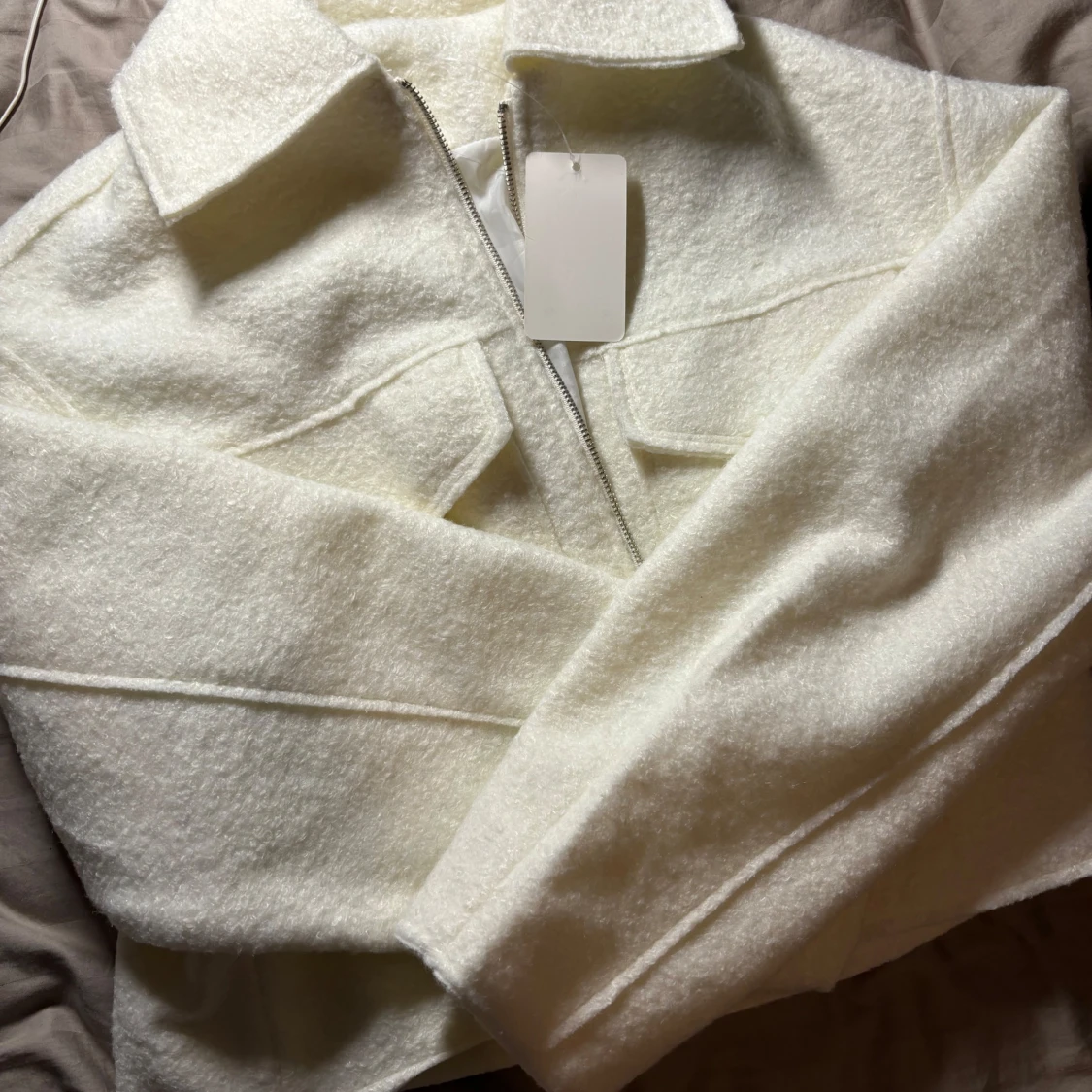 Ulljacka i storlek XS