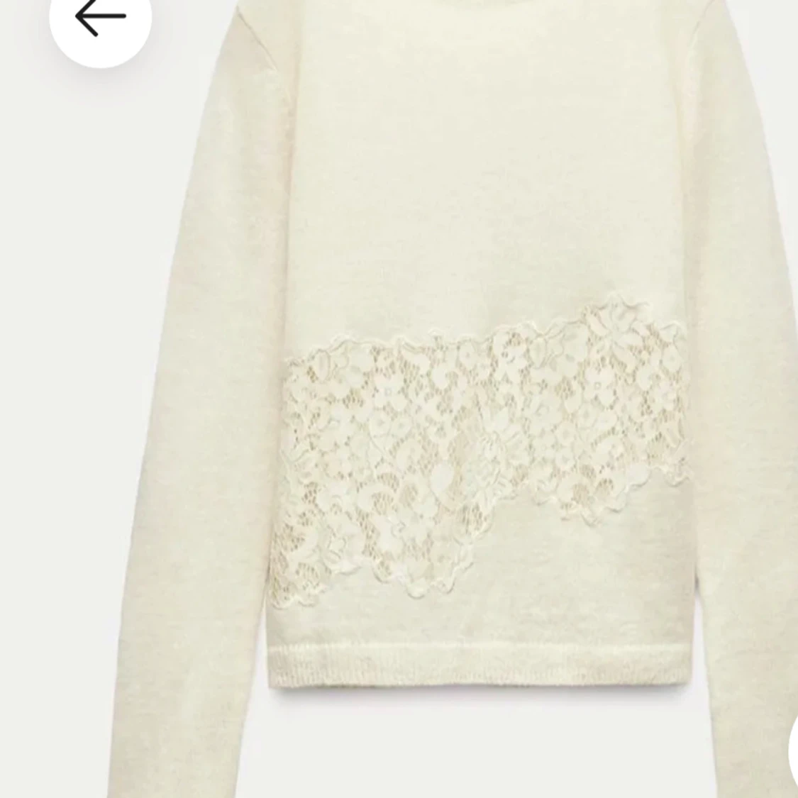 Beige tröja med spetsdetalj