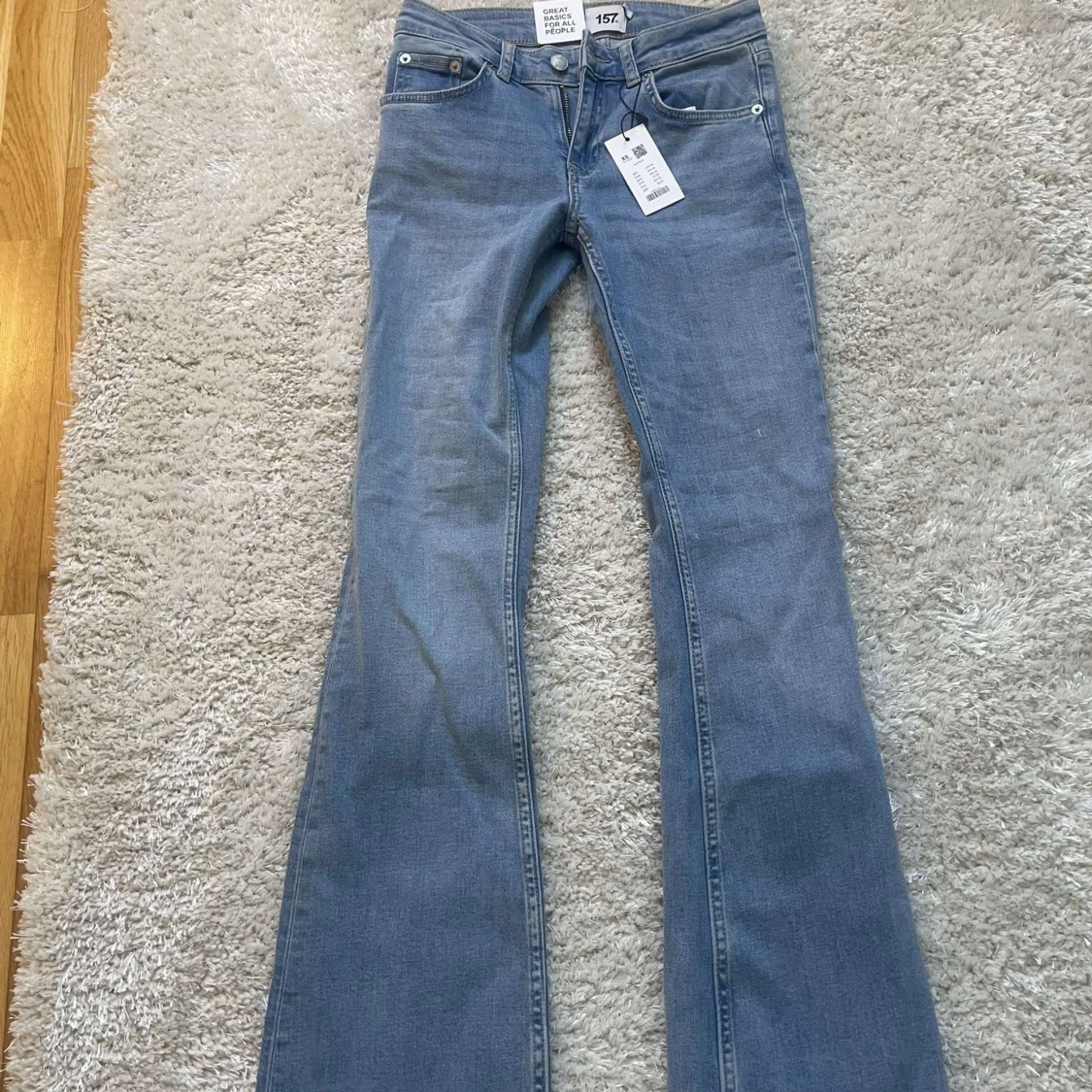 Blå bootcut jeans från 157