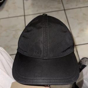 Gucci Nylon cap - Ny tvättad fräsch Gucci Nylon keps storlekM, kom inte med några skambud är ni snälla.