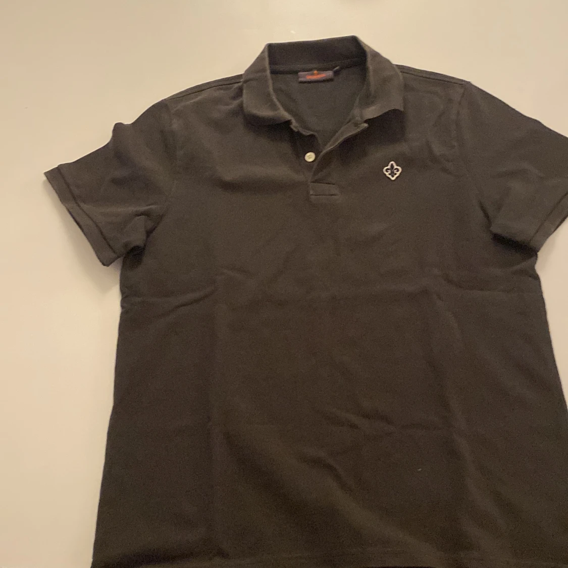 Svart pikétröja från Morris