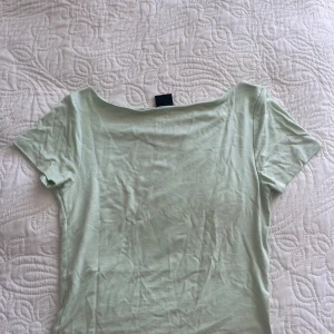 Grön topp - Säljer denna toppen då den inte används längre! 