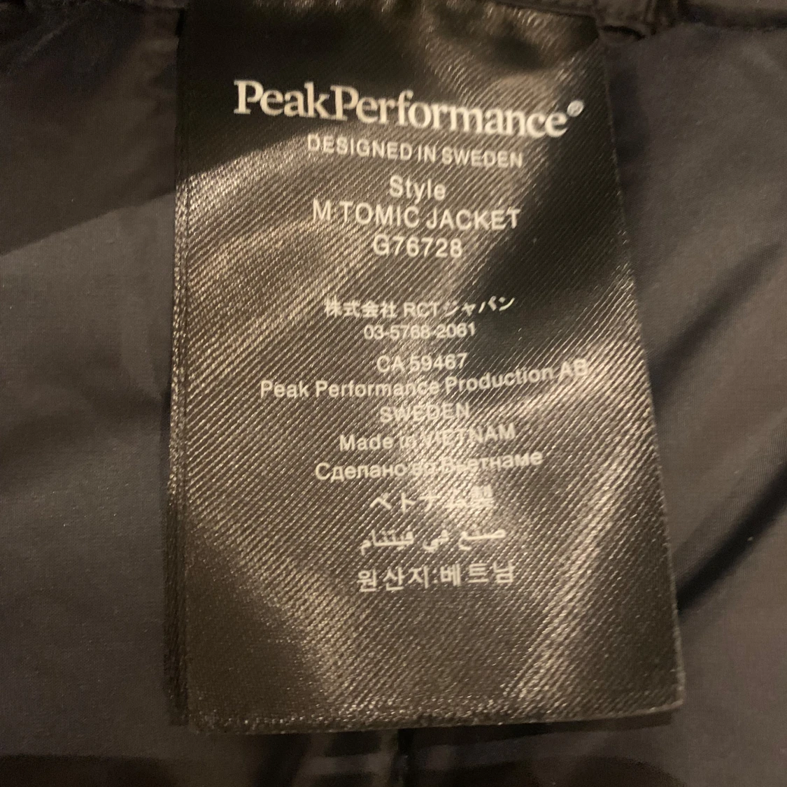 Svart dunjacka från Peak Performance - 92