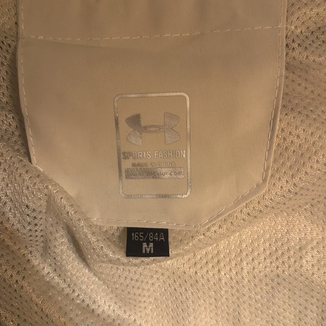 Vit vindjacka från Under Armour - 91