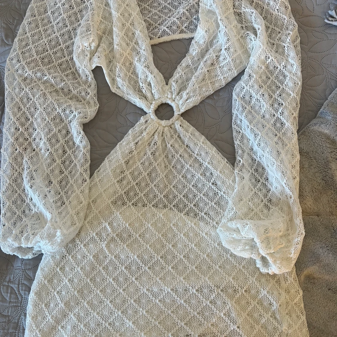 Vit stickad klänning