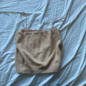 Topp - Aldrig andvänd  Köpt utomlands så d free size Den är gosigt material 