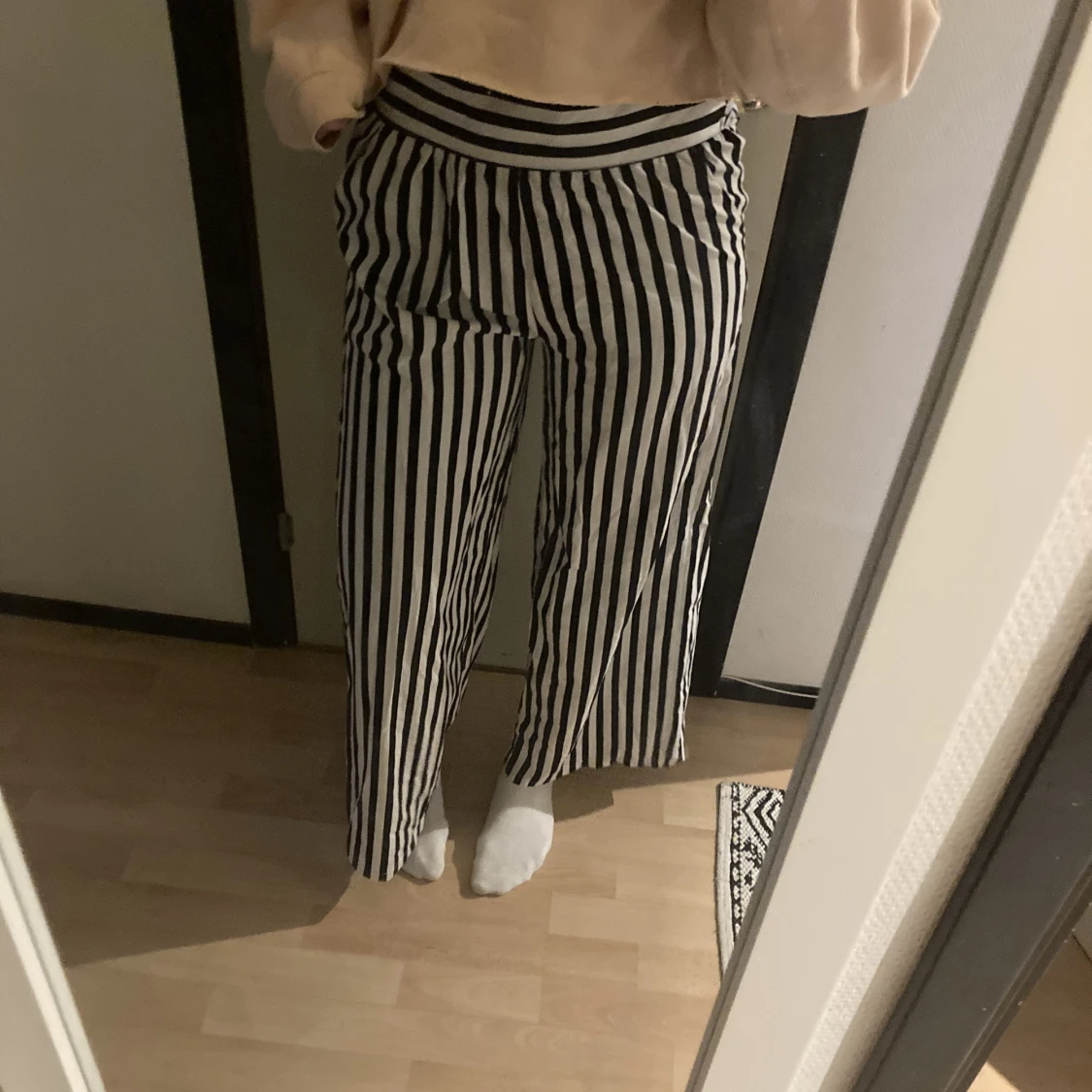 Randiga utsvängda byxor - 90