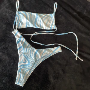 Bikini - Never worn Backless and shows booty