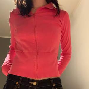 Rosa zipup hoodie utan luva