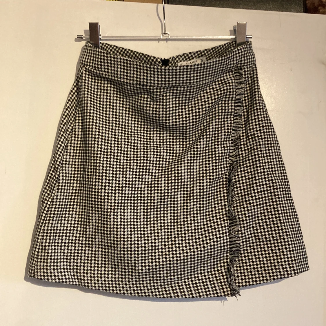 Hundtandsmönstrad kjol