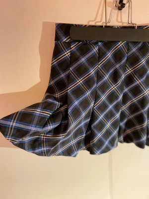 Pleated mini skirt  - HM Divided blue plaid school uniform style skirt. Side zip and button